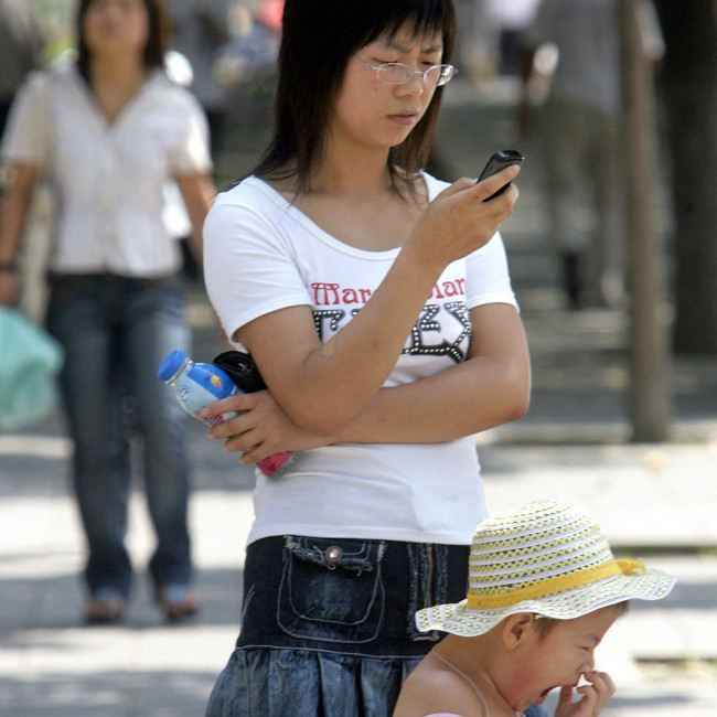 Scrolling on phone in front of a child is more harmful than giving them a screen